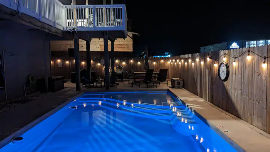 Adjustment Island private heated pool at night