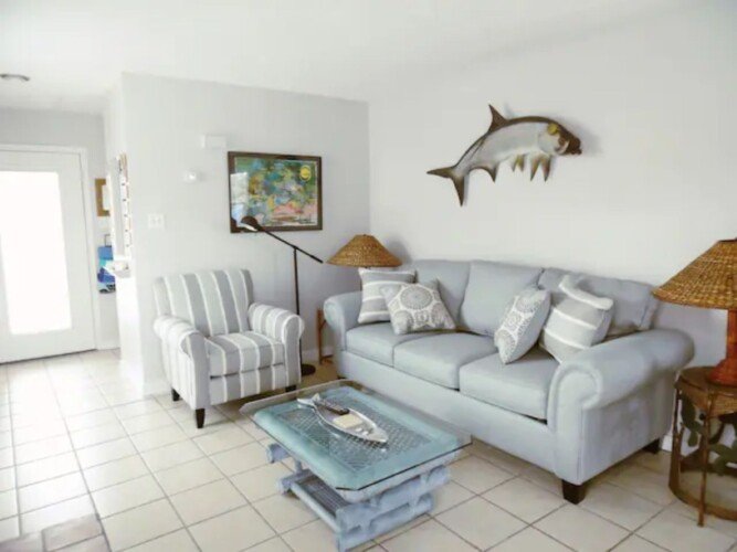 Tarpon Quarters condo living space with coastal decor